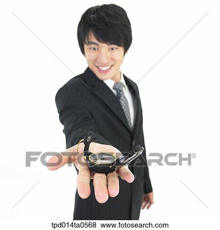 compass, object, Asian, business, businessman, person View Large Photo Image Stock Photo - compass, object, Asian, business, businessman, person. Fotosearch