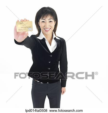 Stock Photo - economy, object, Asian, business, businesswoman, person, credit card. Fotosearch