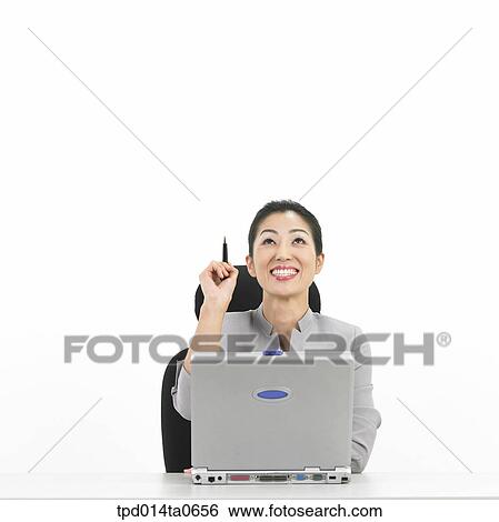 Stock Photograph - notebook, object, Asian, ball point pen, business, businesswoman, person. Fotosearch