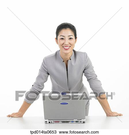 Stock Image - notebook, object, Asian, business, businesswoman, person, woman. Fotosearch