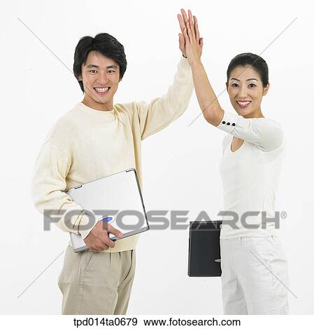 Stock Photo - notebook, object, Asian, business, businessman, businesswoman. Fotosearch