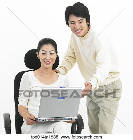 person, Asian, Korean, woman, colleague, object View Large Photo Image Stock Photo - person, Asian, Korean, woman, colleague, object. Fotosearch