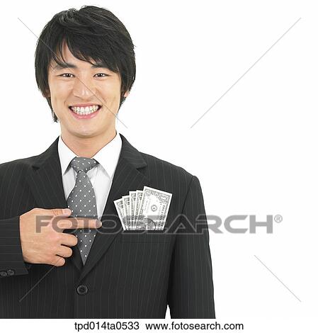 Stock Image - pointing, economy, object, money, Asian, business. Fotosearch