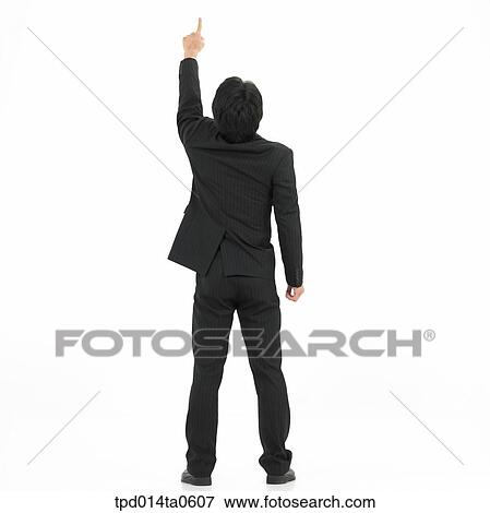 pointing, object, Asian, figure from behind, business, businessman View Large Photo Image Stock Photo - pointing, object, Asian, figure from behind, business, businessman. Fotosearch
