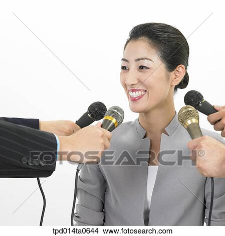reporter, object, Asian, microphone, business, businesswoman, person View Large Photo Image Picture - reporter, object, Asian, microphone, business, businesswoman, person. Fotosearch