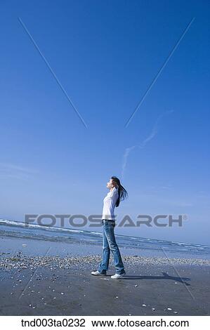 a woman in a seashore View Large Photo Image Stock Image - a woman in a seashore. Fotosearch
