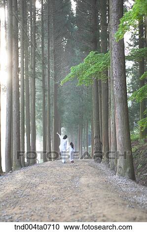 a mother and a child in a forest View Large Photo Image Stock Image - a mother and a child in a forest. Fotosearch