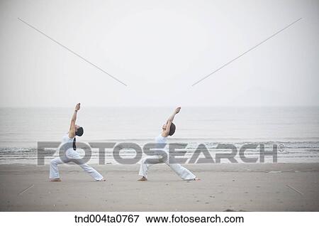a woman doing Yoga in a seashore View Large Photo Image Stock Photo - a woman doing Yoga in a seashore. Fotosearch
