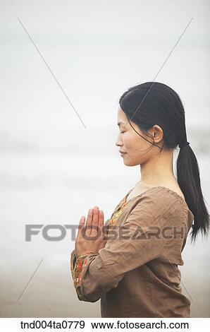 a woman doing Yoga View Large Photo Image Stock Photo - a woman doing Yoga. Fotosearch