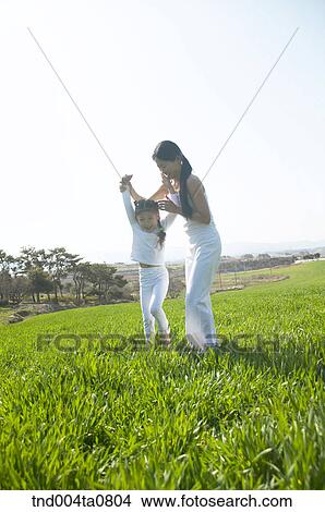 Picture - Yoga/ a woman doing yoga. Fotosearch
