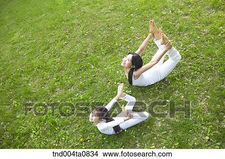 Yoga/ a woman doing yoga View Large Photo Image Picture - Yoga/ a woman doing yoga. Fotosearch