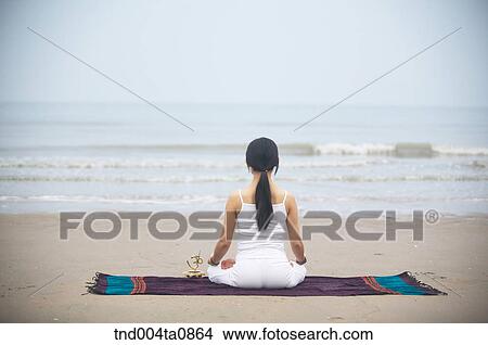 Yoga/ a woman doing yoga View Large Photo Image Picture - Yoga/ a woman doing yoga. Fotosearch