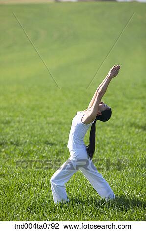 Yoga/ a woman doing yoga View Large Photo Image Stock Image - Yoga/ a woman doing yoga. Fotosearch