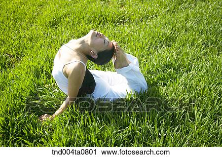 Yoga/ a woman doing yoga View Large Photo Image Stock Image - Yoga/ a woman doing yoga. Fotosearch