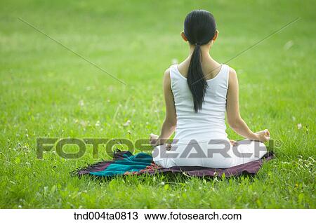Yoga/ a woman doing yoga View Large Photo Image Stock Image - Yoga/ a woman doing yoga. Fotosearch