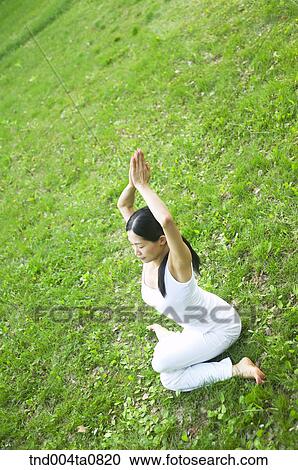 Yoga/ a woman doing yoga View Large Photo Image Stock Image - Yoga/ a woman doing yoga. Fotosearch
