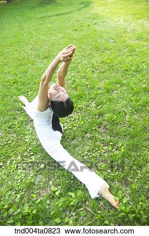 Yoga/ a woman doing yoga View Large Photo Image Stock Image - Yoga/ a woman doing yoga. Fotosearch