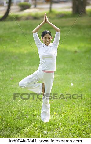 Yoga/ a woman doing yoga View Large Photo Image Stock Image - Yoga/ a woman doing yoga. Fotosearch