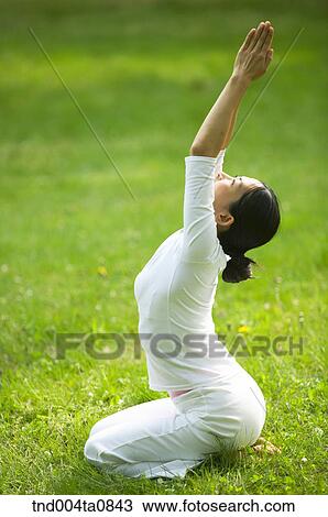 Stock Image - Yoga/ a woman doing yoga. Fotosearch