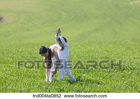 Yoga/ a woman doing yoga View Large Photo Image Stock Image - Yoga/ a woman doing yoga. Fotosearch