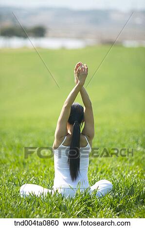 Stock Image - Yoga/ a woman doing yoga. Fotosearch