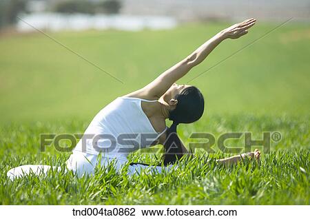 Yoga/ a woman doing yoga View Large Photo Image Stock Image - Yoga/ a woman doing yoga. Fotosearch