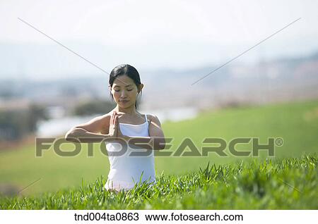 Yoga/ a woman doing yoga View Large Photo Image Stock Image - Yoga/ a woman doing yoga. Fotosearch