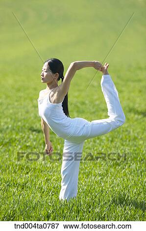 Stock Photo - Yoga/ a woman doing yoga. Fotosearch