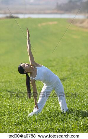 Yoga/ a woman doing yoga View Large Photo Image Stock Photo - Yoga/ a woman doing yoga. Fotosearch