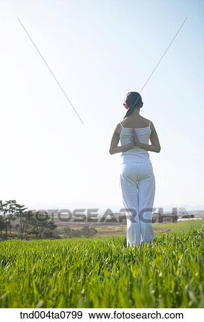 Yoga/ a woman doing yoga View Large Photo Image Stock Photo - Yoga/ a woman doing yoga. Fotosearch