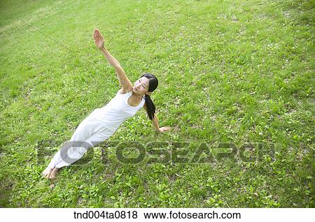 Stock Photo - Yoga/ a woman doing yoga. Fotosearch