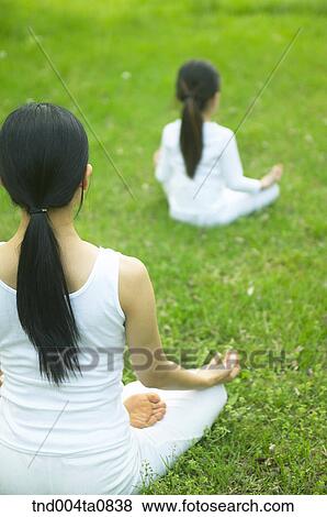 Yoga/ a woman doing yoga View Large Photo Image Stock Photo - Yoga/ a woman doing yoga. Fotosearch