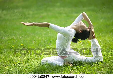 Stock Photo - Yoga/ a woman doing yoga. Fotosearch