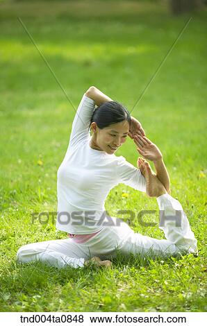 Yoga/ a woman doing yoga View Large Photo Image Stock Photo - Yoga/ a woman doing yoga. Fotosearch