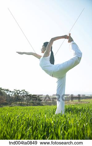 Yoga/ a woman doing yoga View Large Photo Image Stock Photo - Yoga/ a woman doing yoga. Fotosearch