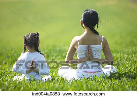 Yoga/ a woman doing yoga View Large Photo Image Stock Photo - Yoga/ a woman doing yoga. Fotosearch