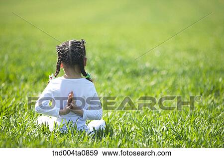 Stock Photo - Yoga/ a woman doing yoga. Fotosearch