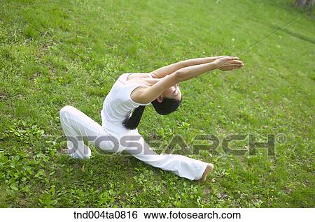 Yoga/ a woman doing yoga View Large Photo Image Stock Photograph - Yoga/ a woman doing yoga. Fotosearch