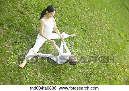 Yoga/ a woman doing yoga View Large Photo Image Stock Photograph - Yoga/ a woman doing yoga. Fotosearch