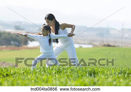 Yoga/ a woman doing yoga View Large Photo Image Stock Photograph - Yoga/ a woman doing yoga. Fotosearch