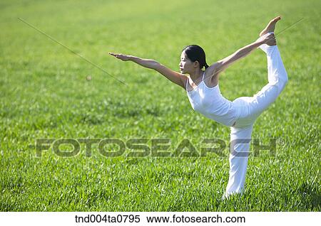 Yoga/ a woman doing yoga View Large Photo Image Stock Photography - Yoga/ a woman doing yoga. Fotosearch