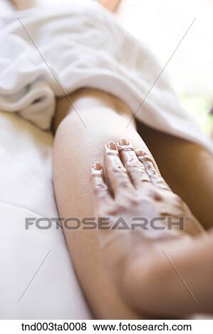 spa/ a massager putting an oil View Large Photo Image Stock Photo - spa/ a massager putting an oil. Fotosearch