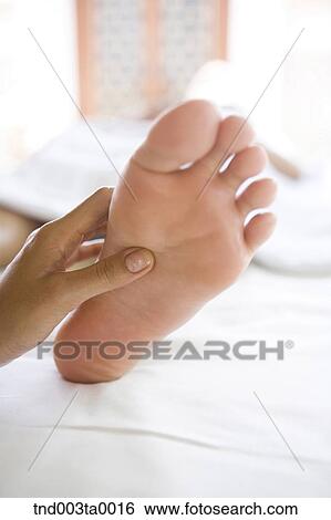 spa/ a massaging woman View Large Photo Image Stock Photograph - spa/ a massaging woman. Fotosearch