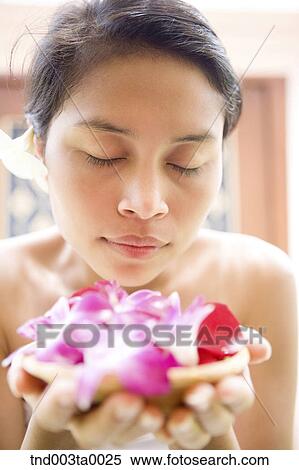 Stock Photography - spa/ a smelling woman. Fotosearch