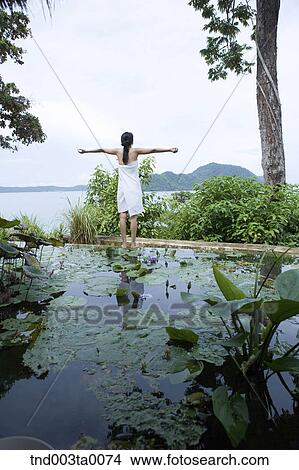 spa/ a woman in a garden View Large Photo Image Picture - spa/ a woman in a garden. Fotosearch