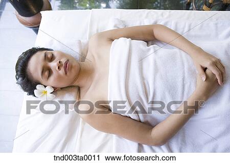 spa/ a woman taking a rest View Large Photo Image Stock Image - spa/ a woman taking a rest. Fotosearch