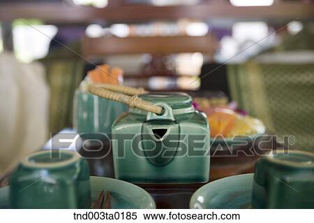 a tea pot and cups View Large Photo Image Stock Photography - a tea pot and cups. Fotosearch
