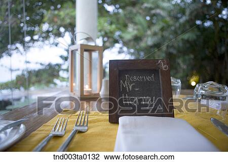 Stock Image - hotel resort, tables in a restaurant. Fotosearch