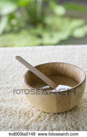 spa, pack in a vessel and a stick View Large Photo Image Stock Photo - spa, pack in a vessel and a stick. Fotosearch