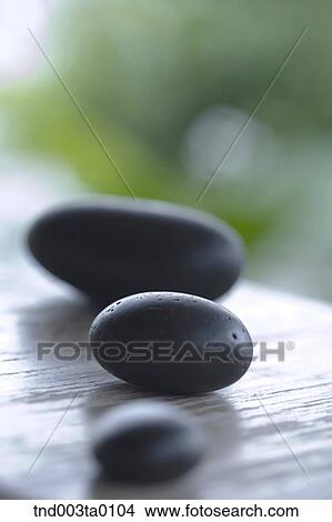 spa, pebbles on a table View Large Photo Image Picture - spa, pebbles on a table. Fotosearch
